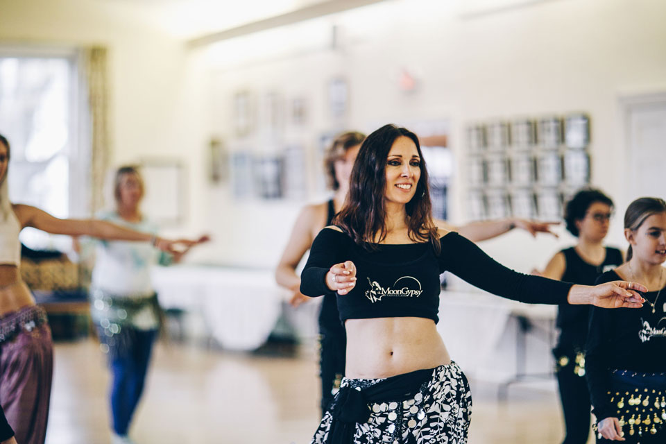 Lurainya Koerber from MoonGypsy Productions teaching bellydance and fitness at women's wellness event in Doylestown, PA